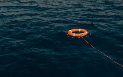 Empty life preserver in open water