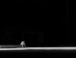 Man alone on bench