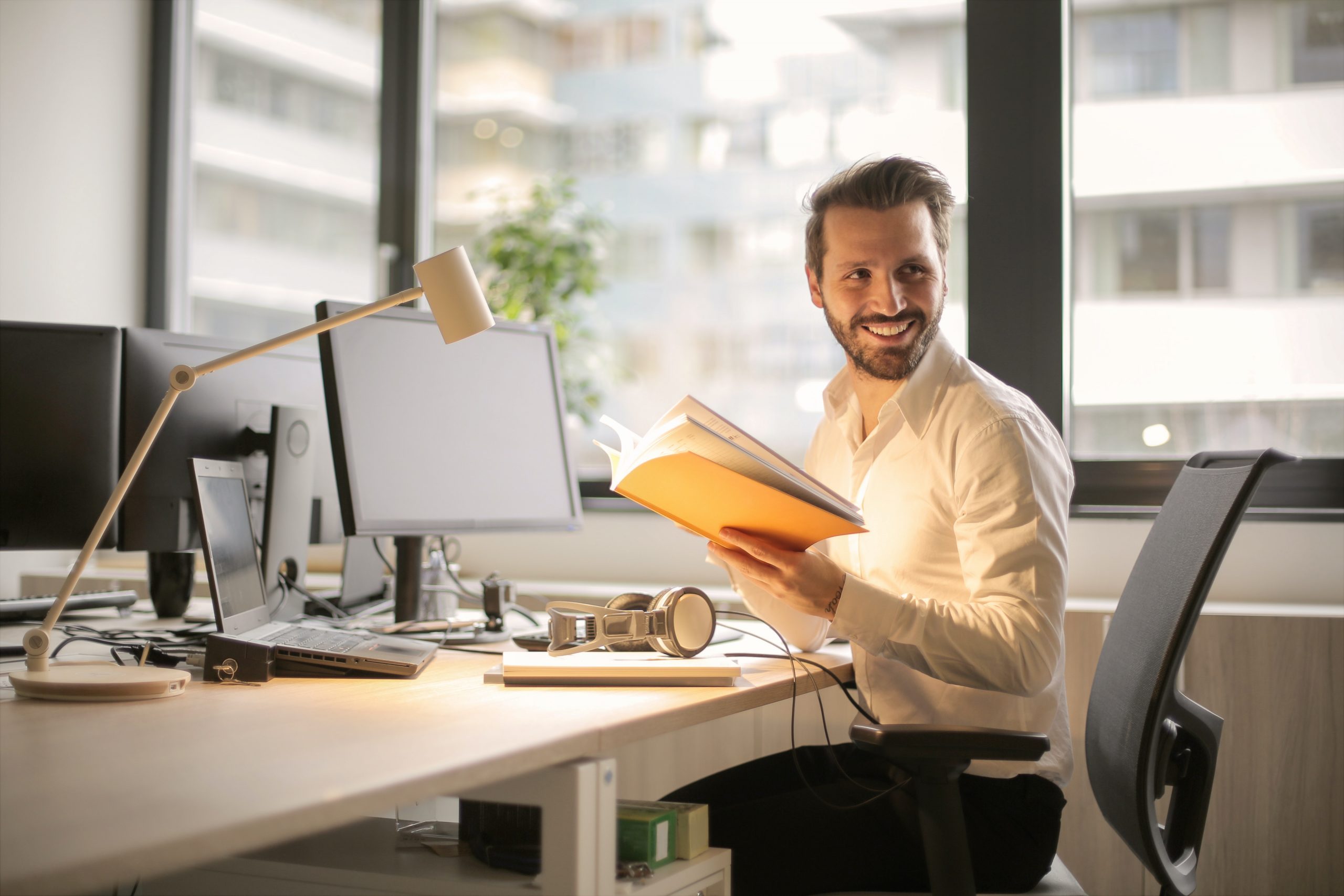 Man smiling in office